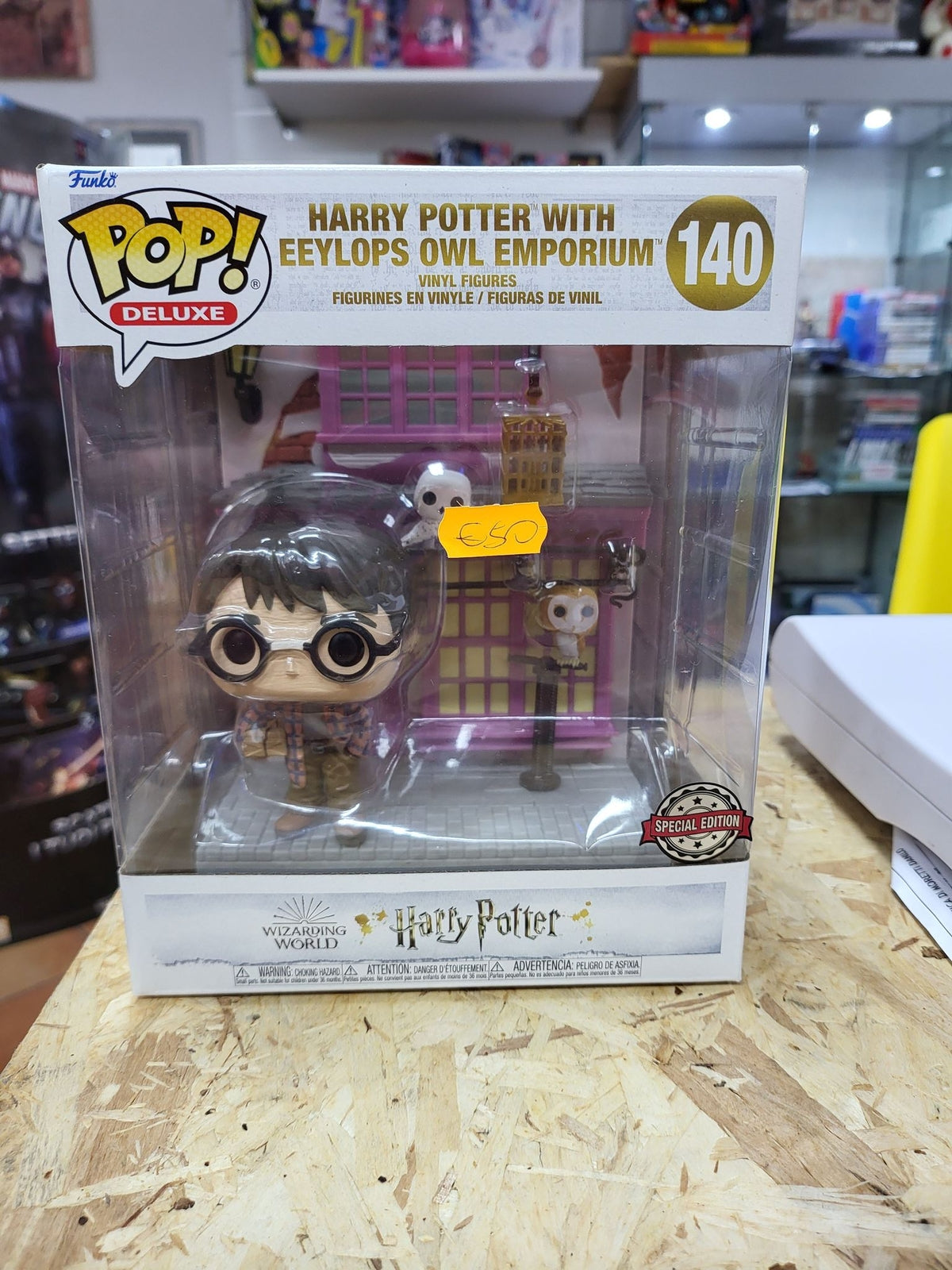 Funko pop deluxe 140 harry potter with eeylops owl emporium