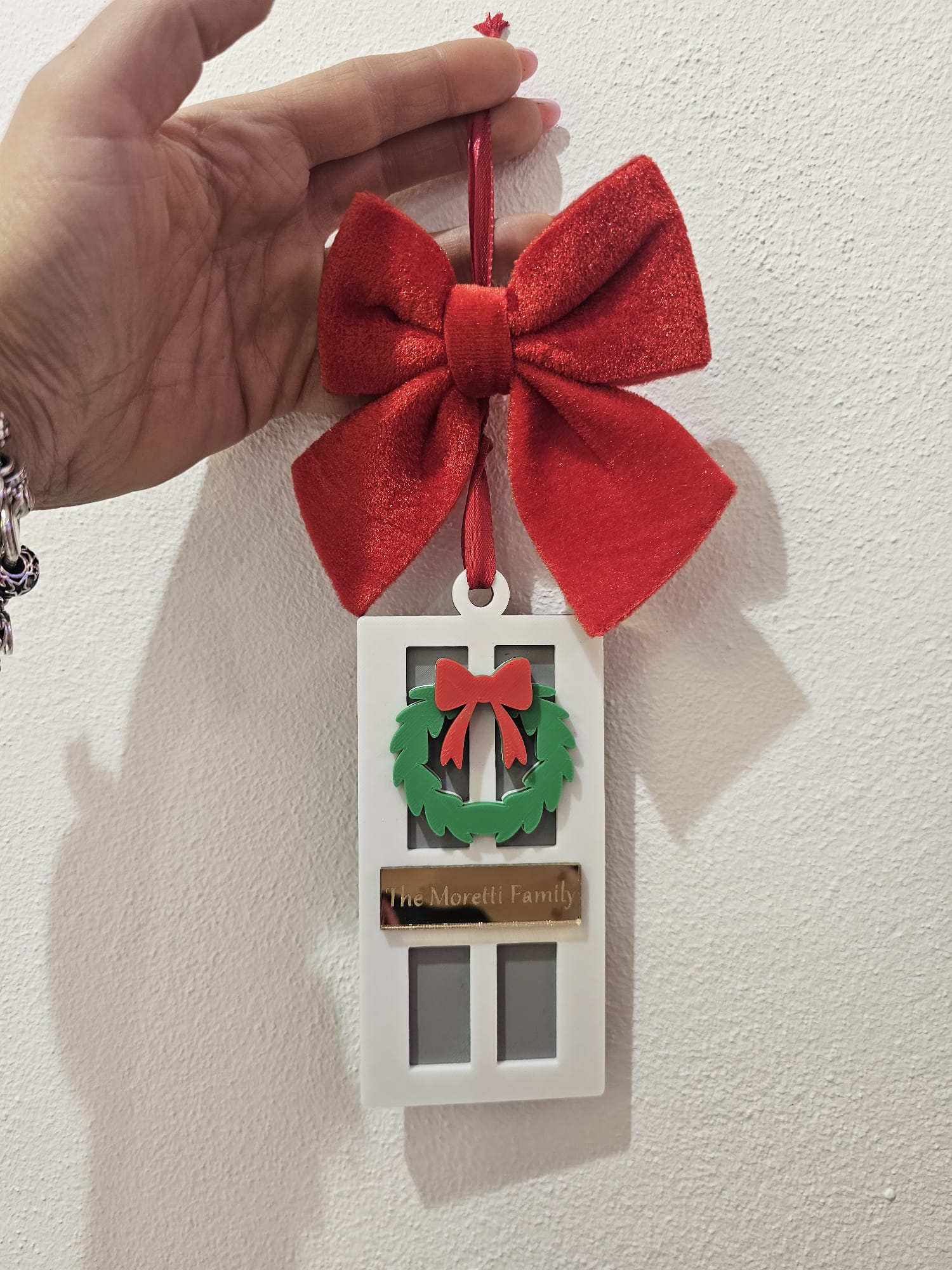 Porta da appendere natalizia con targa in plexi specchiato oro